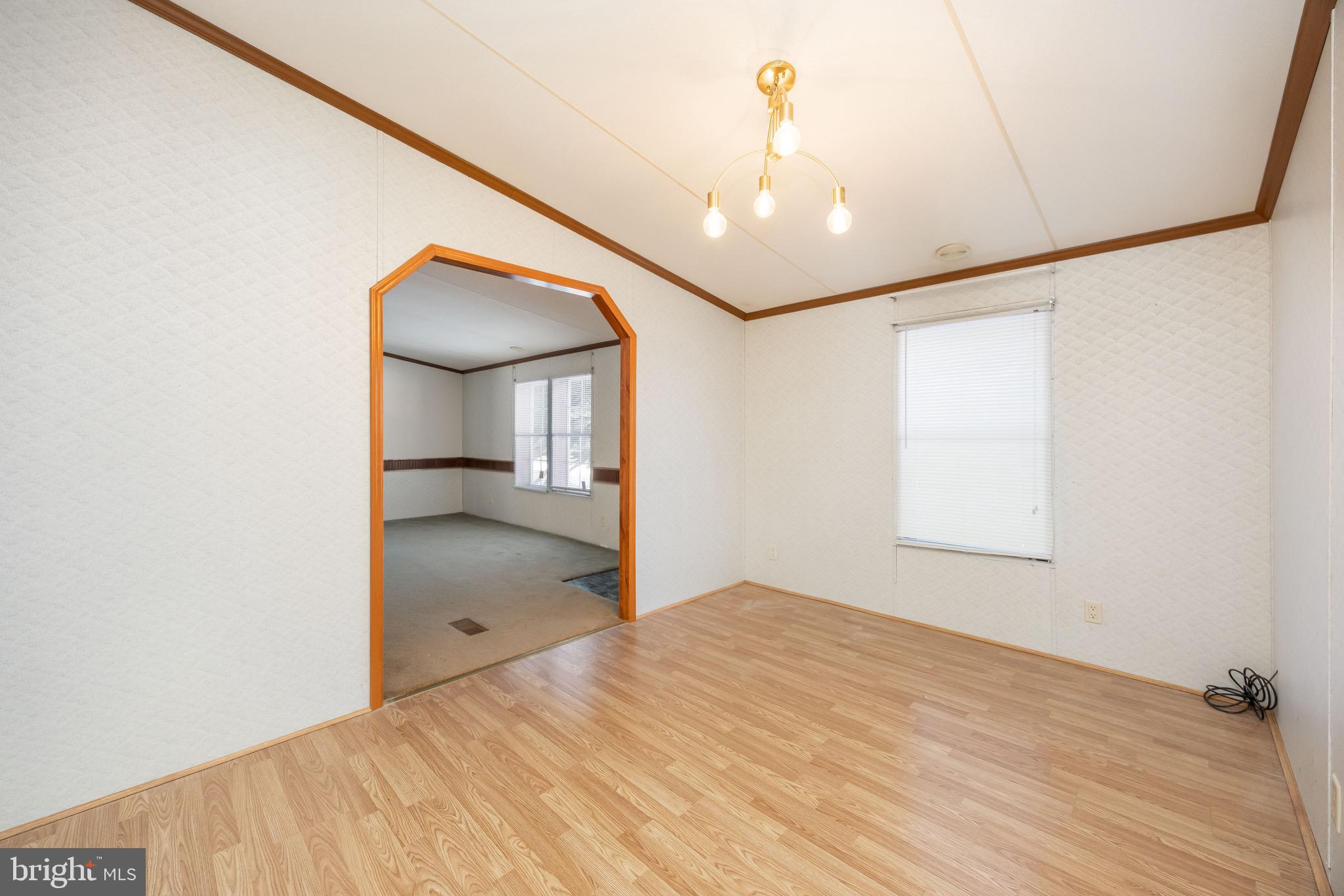 22147 Royal Oak Road Quantico, MD 21856 - Photo 21 of 65 a view of a room with a ceiling fan and a bathroom