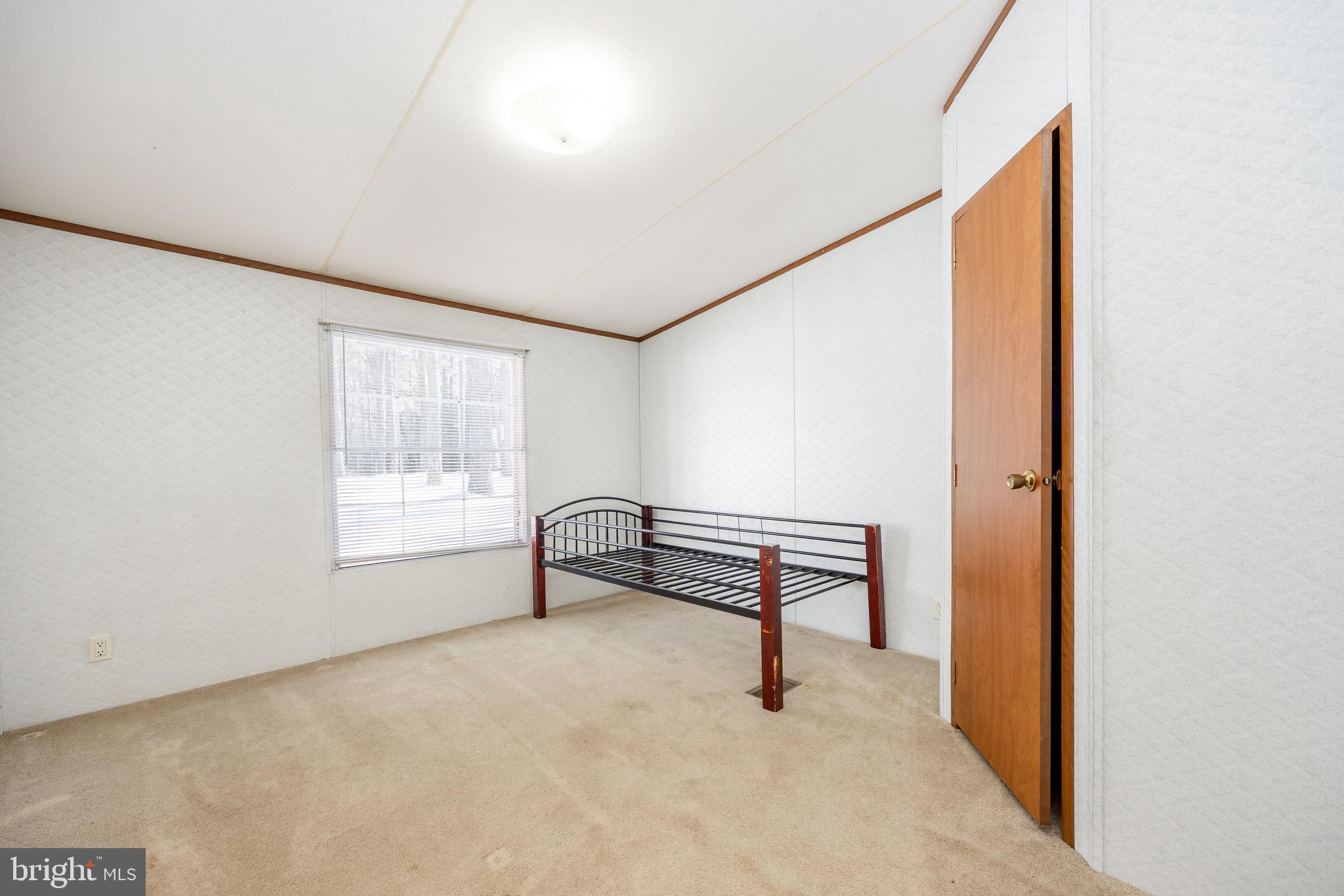 22147 Royal Oak Road Quantico, MD 21856 - Photo 38 of 65 a view of an empty room with a window