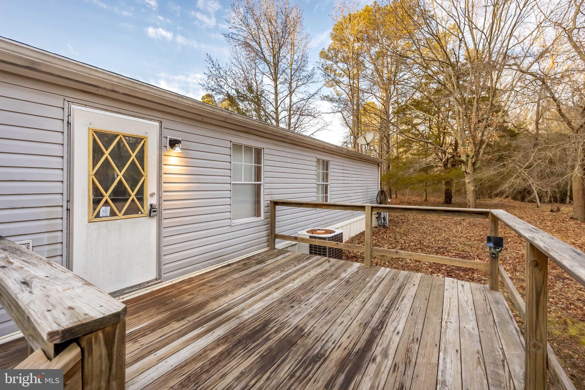22147 Royal Oak Road Quantico, MD 21856 - Photo 51 of 65 a view of balcony with wooden floor and fence