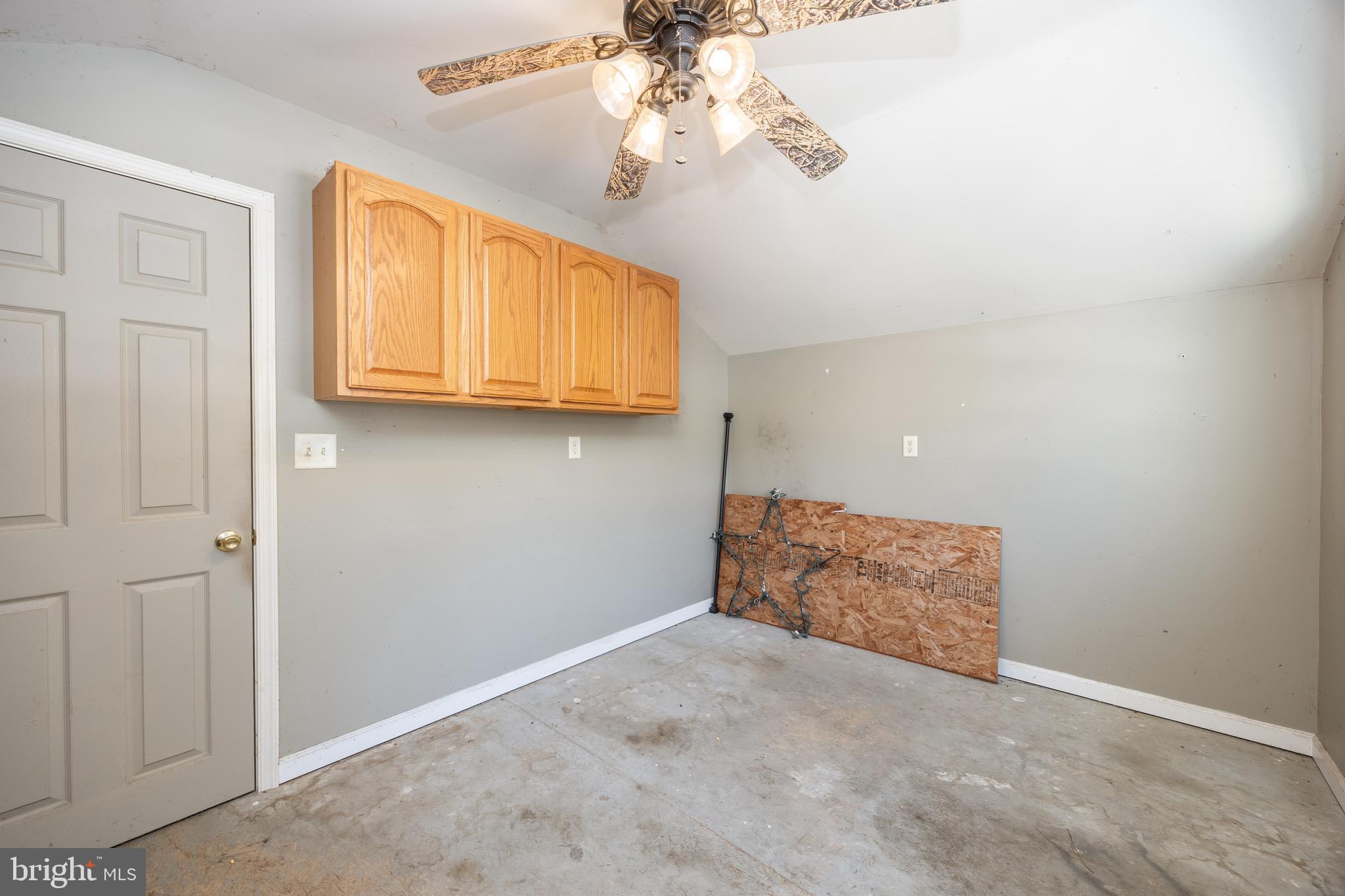 22147 Royal Oak Road Quantico, MD 21856 - Photo 53 of 65 a view of kitchen and chandelier fan