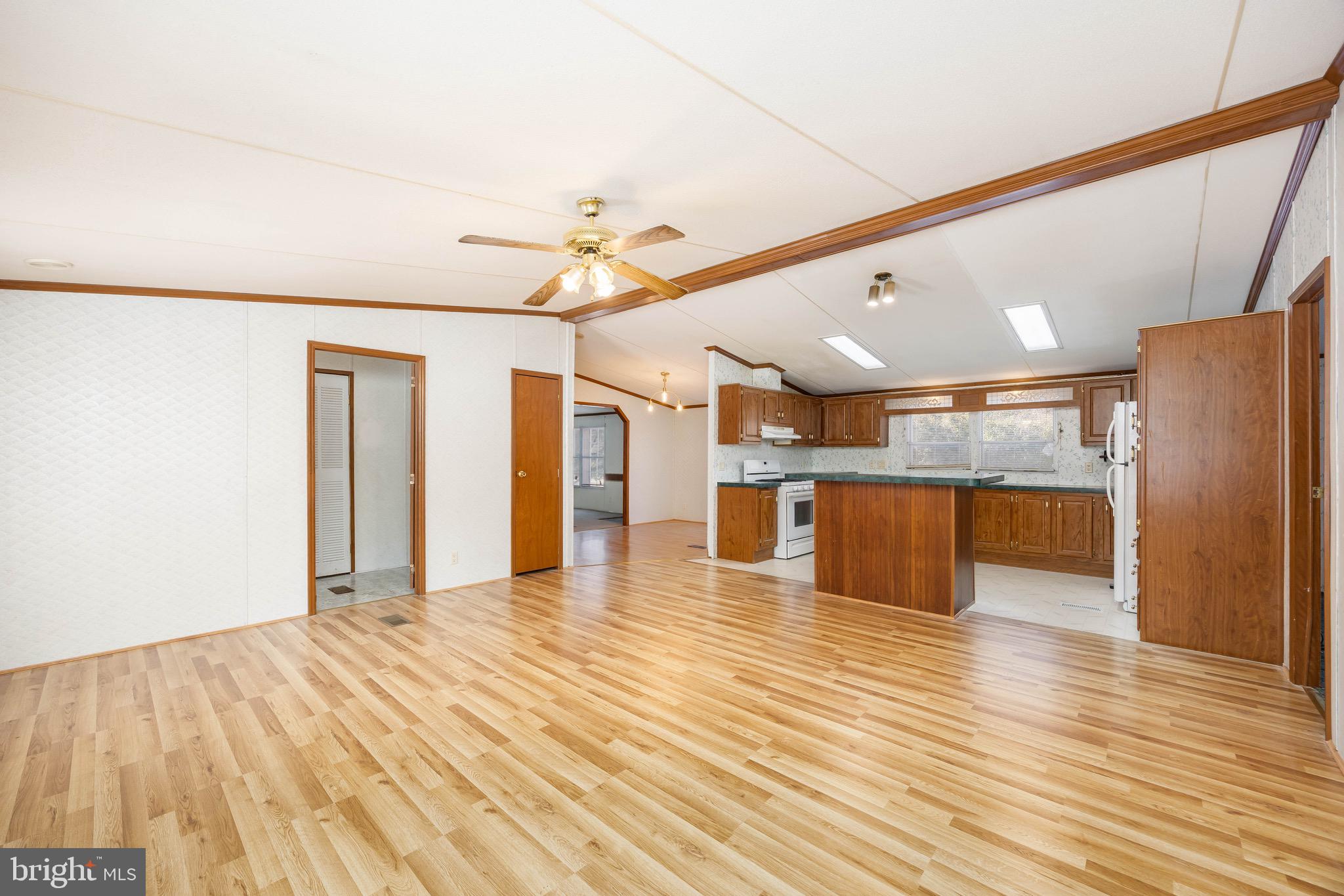22147 Royal Oak Road Quantico, MD 21856 - Photo 8 of 65 a view of an empty room with wooden floor