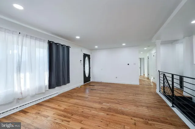 a view of a livingroom with a staircase