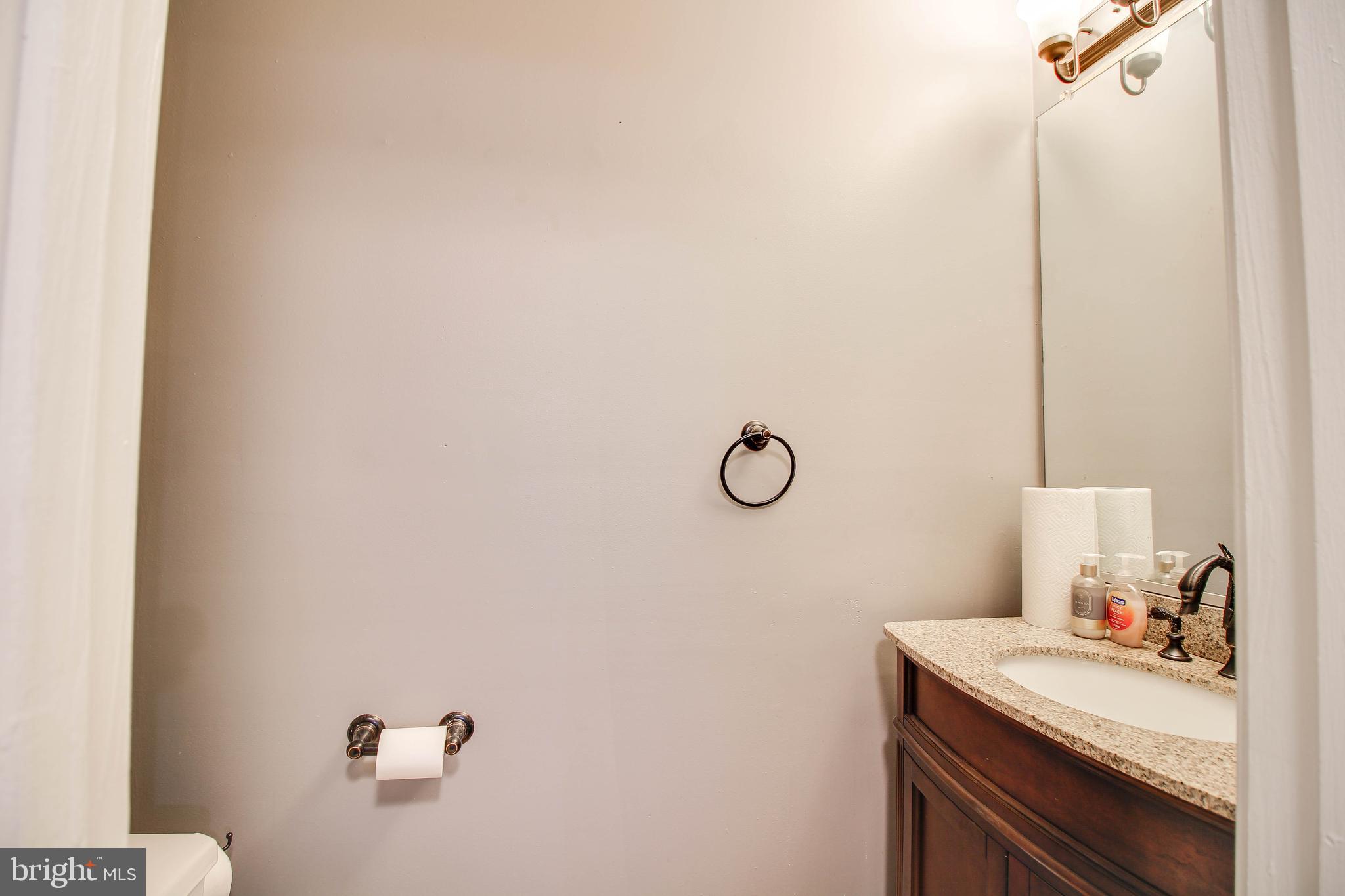 1408 Olmstead Street Curtis Bay, MD 21226 - Photo 11 of 40 a view of a storage and utility room with a door