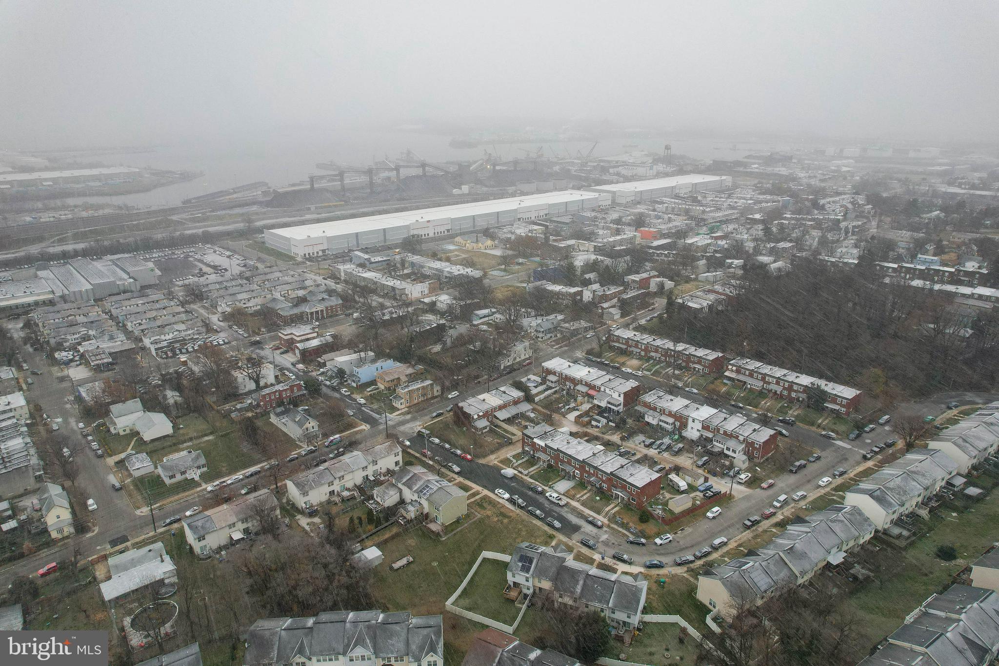 1408 Olmstead Street Curtis Bay, MD 21226 - Photo 37 of 40 an aerial view of a house with a yard