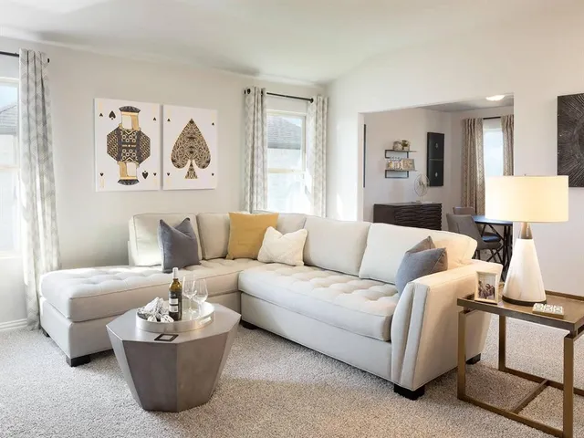 a living room with furniture and a couch