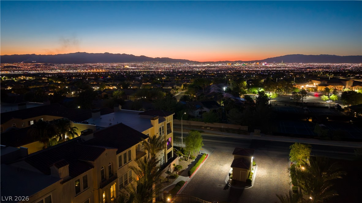 2555 Hampton Road, Unit 3308 Henderson, NV 89052 - Photo 48 of 65 Vast city lights extend under the tranquil twilight, creating an inspiring panoramic outlook.