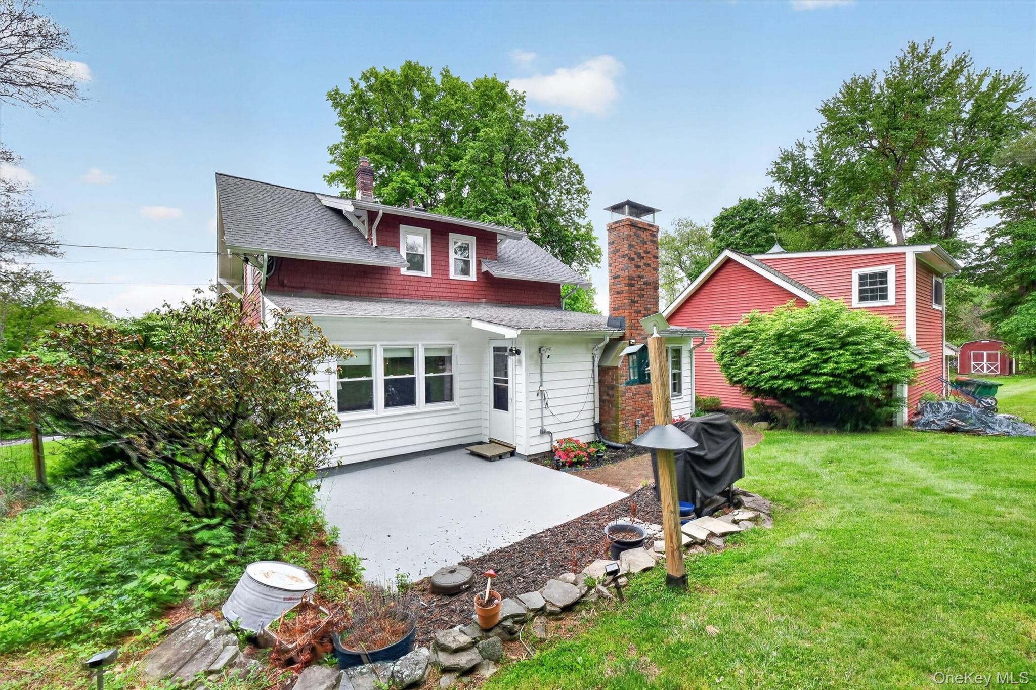 10 Edwin Road Poughkeepsie, NY 12603 - Photo 30 of 46 a view of a house with a yard and a garden