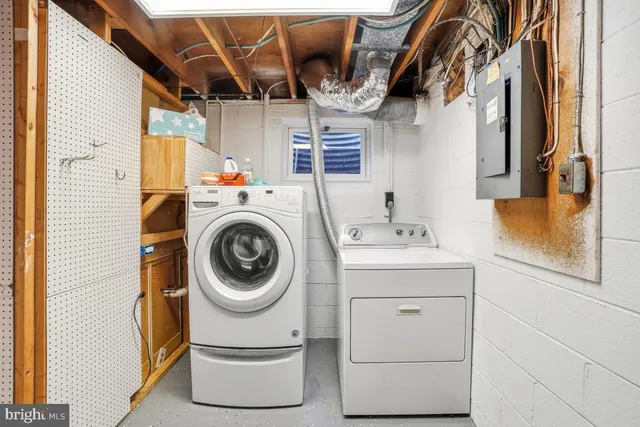 a utility room with dryer and washer