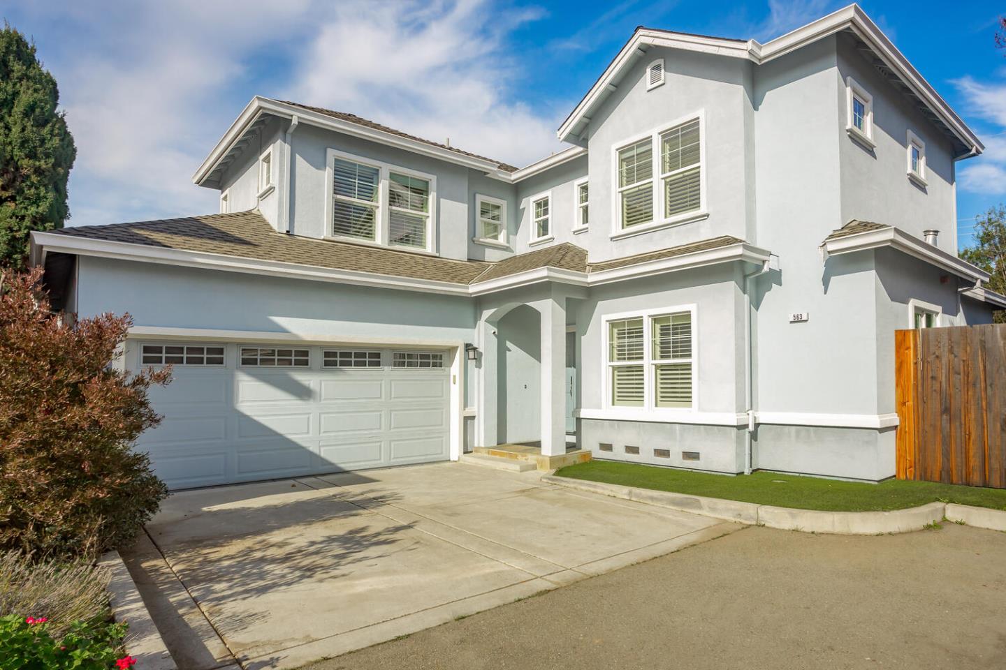 563 Alberta Avenue Sunnyvale, CA 94087 - Photo 1 of 32 a front view of a house with a yard and garage