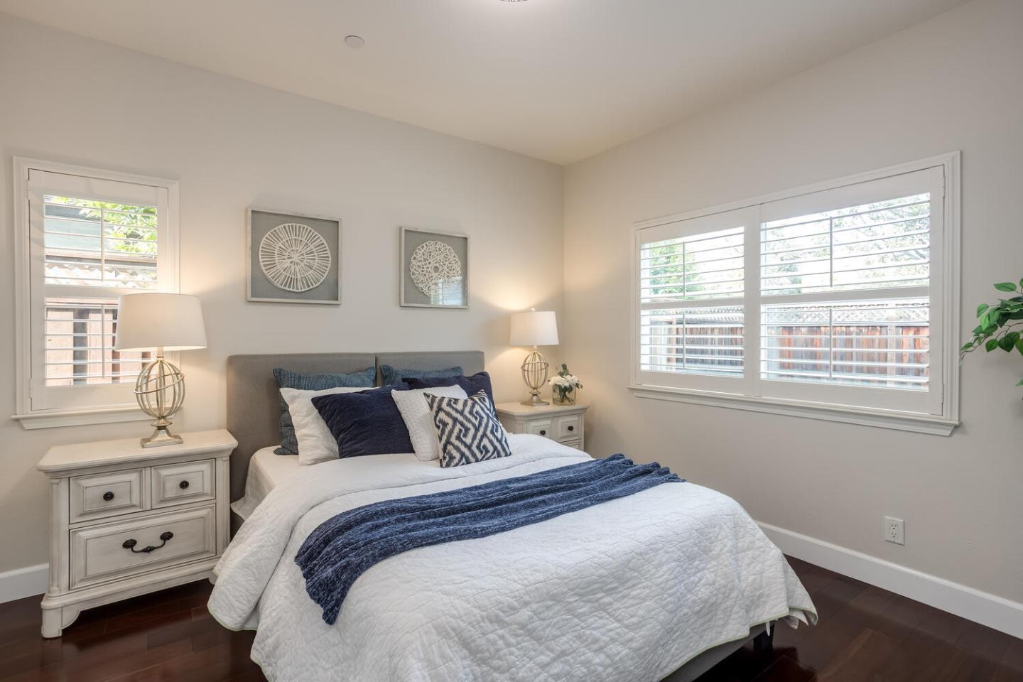 563 Alberta Avenue Sunnyvale, CA 94087 - Photo 11 of 32 a bedroom with a bed and a window