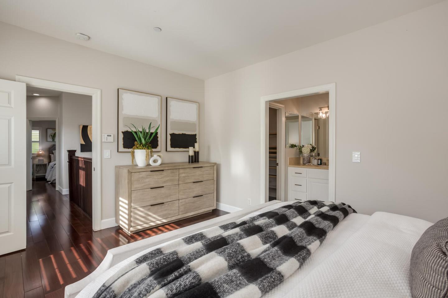 563 Alberta Avenue Sunnyvale, CA 94087 - Photo 19 of 32 a bedroom with a bed and wooden floor