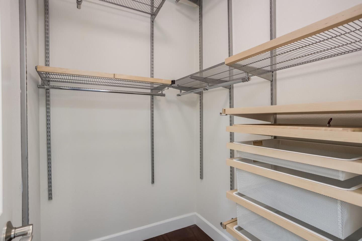 563 Alberta Avenue Sunnyvale, CA 94087 - Photo 22 of 32 a view of a room with racks on the wall