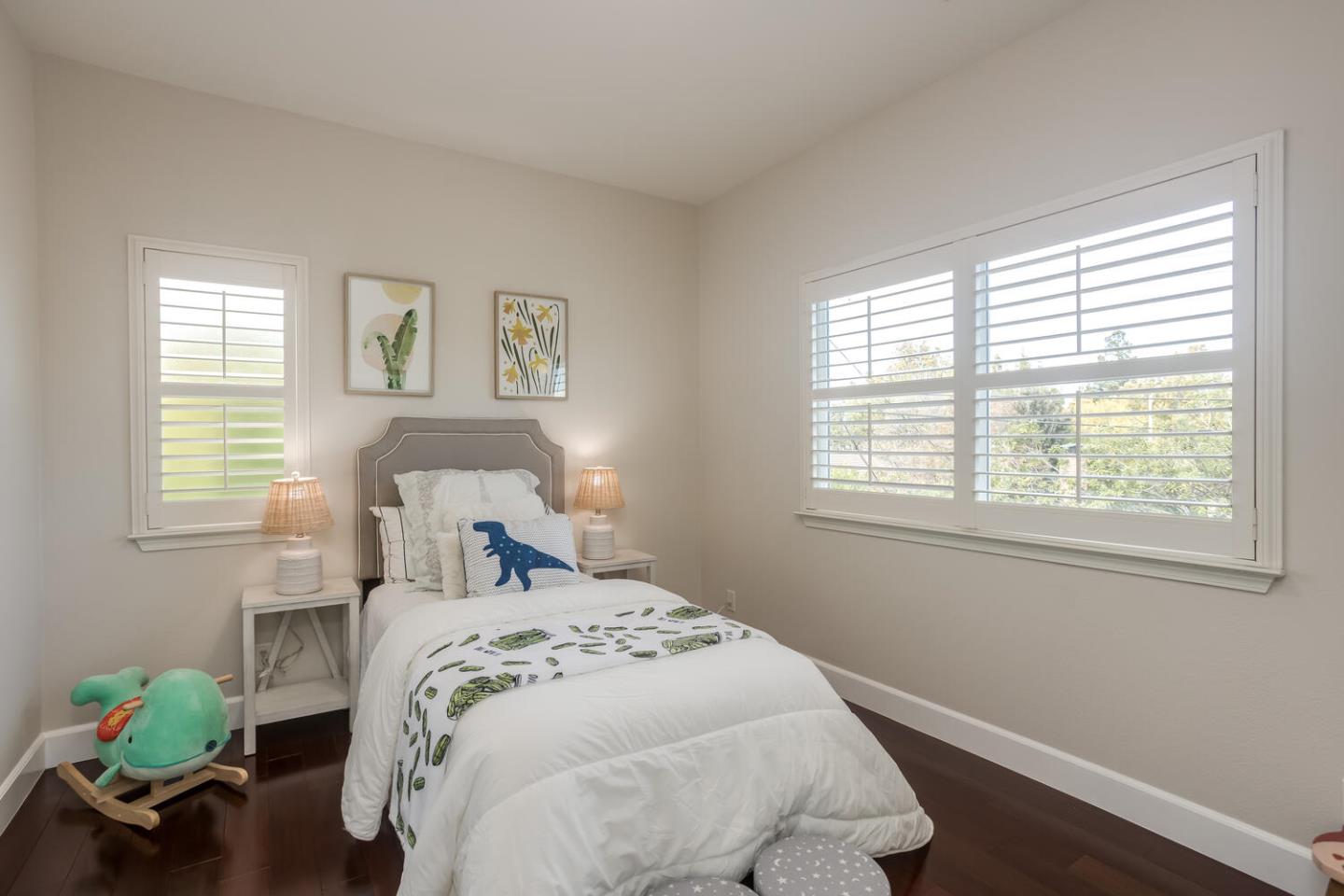 563 Alberta Avenue Sunnyvale, CA 94087 - Photo 26 of 32 a bedroom with a bed and a window