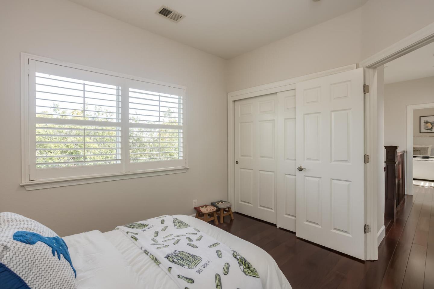 563 Alberta Avenue Sunnyvale, CA 94087 - Photo 27 of 32 a bedroom with a bed and a window