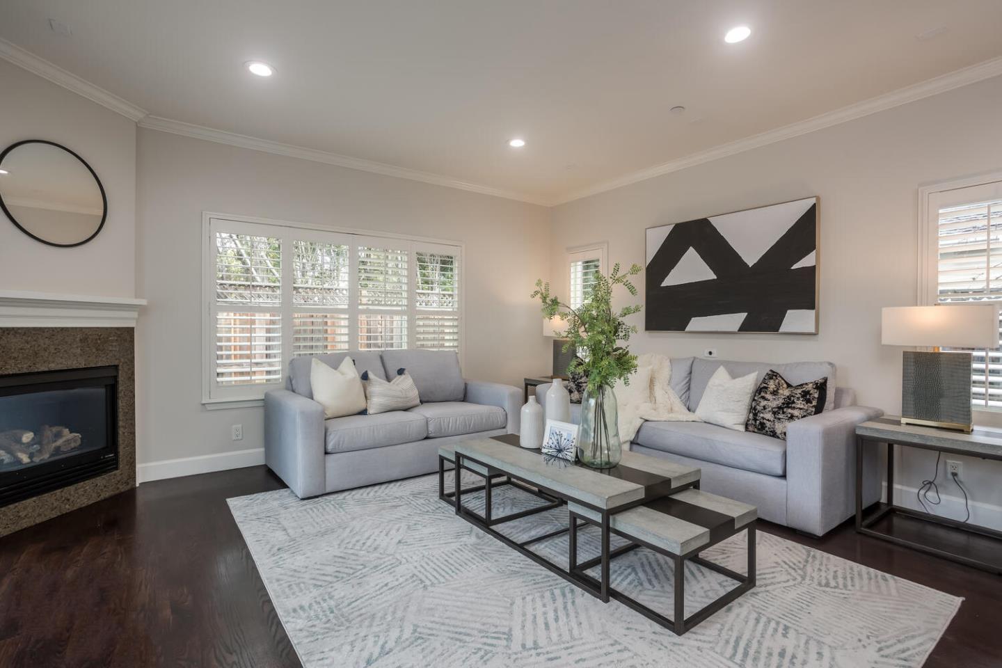 563 Alberta Avenue Sunnyvale, CA 94087 - Photo 5 of 32 a living room with furniture a fireplace with wooden floor