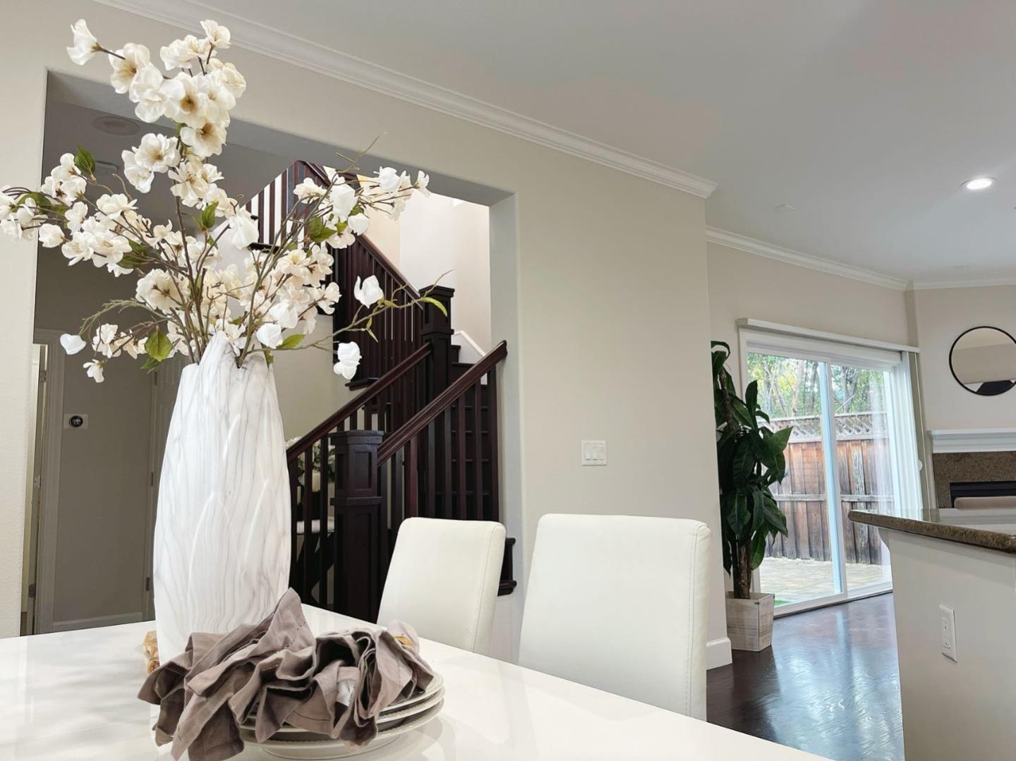 563 Alberta Avenue Sunnyvale, CA 94087 - Photo 9 of 32 a living room with furniture and a fireplace