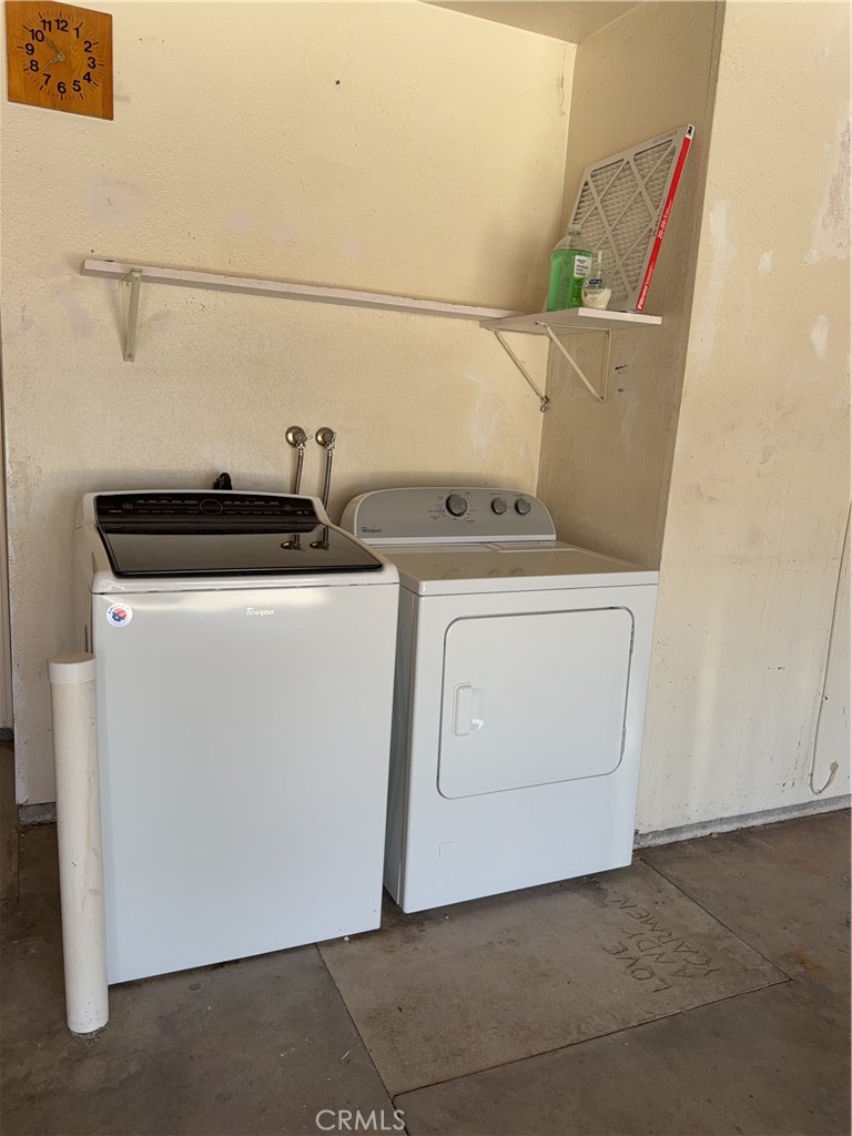 12590 Cobalt Road Victorville, CA 92392 - Photo 35 of 37 a utility room with dryer and washer