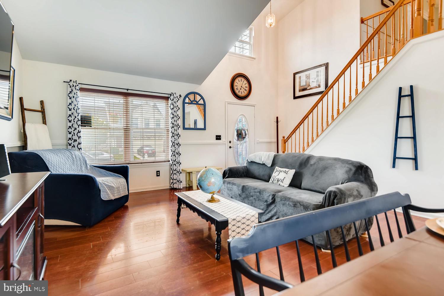 4517 Sandwood Road Baltimore, MD 21219 - Photo 3 of 27 a living room with furniture and a large window
