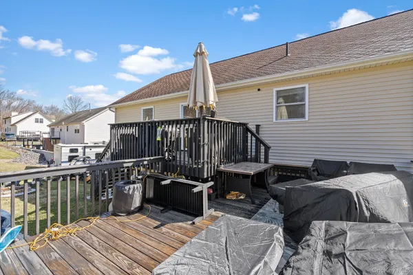 a view of dinning table and chairs in patio