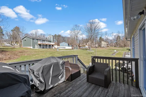 a view of a roof deck with couches