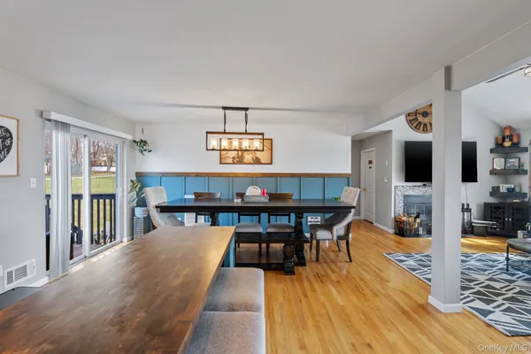 a view of a living room and dining room