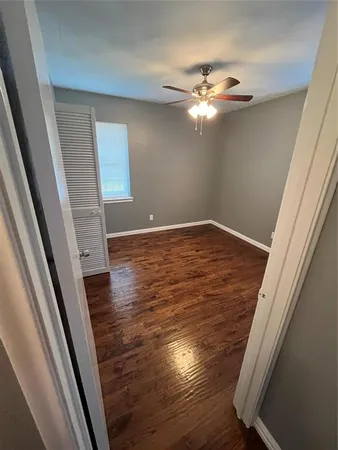 a view of a livingroom with wooden floor