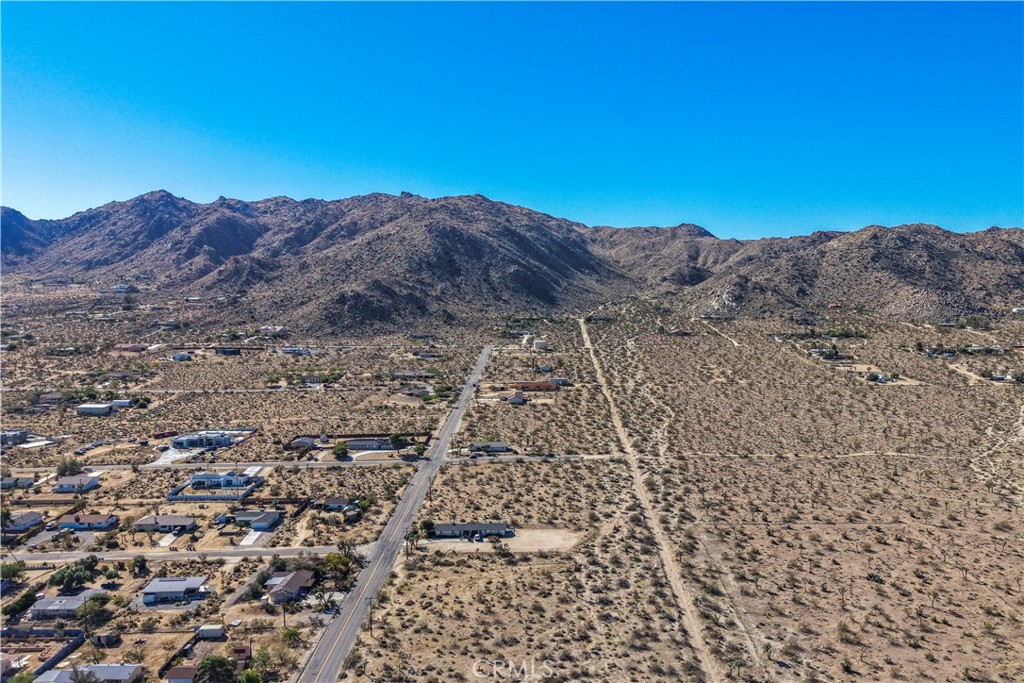 7442 Olympic Road Joshua Tree, CA 92252 - Photo 5 of 15 a view of houses with a street