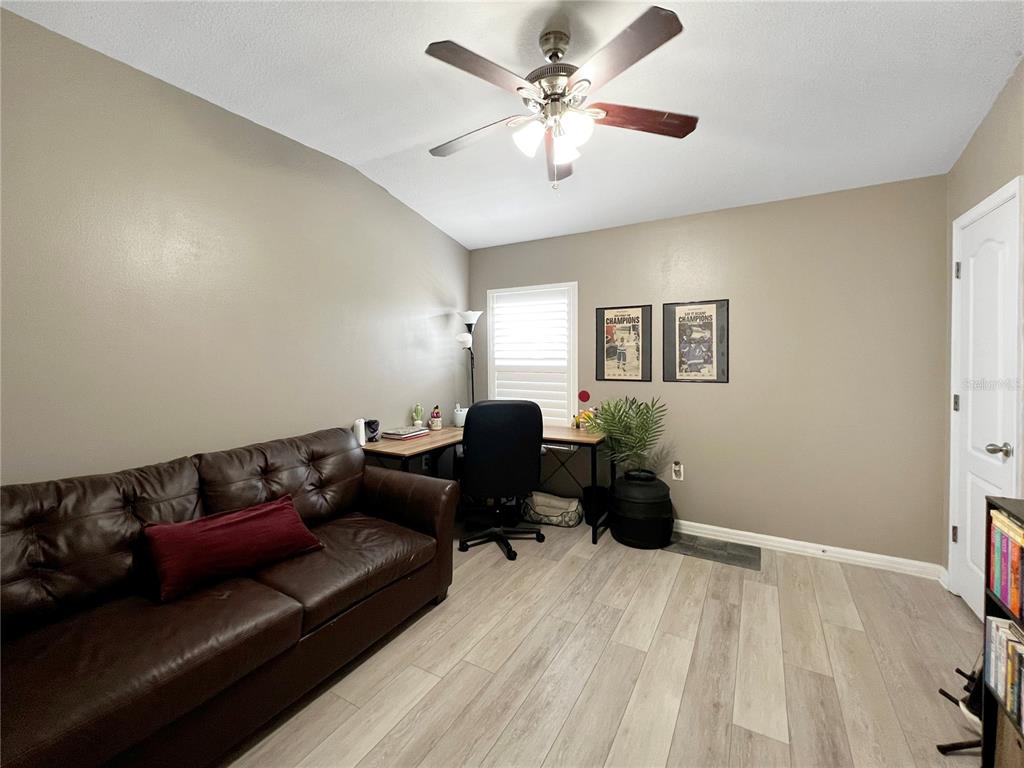 15767 Stable Run Drive Spring Hill, FL 34610 - Photo 28 of 34 a living room with furniture