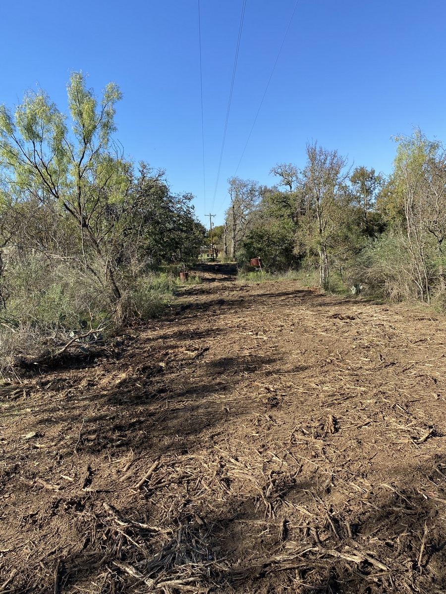 0 Ranch Road 2241 Tow, TX 78672 - Photo 32 of 33 A spacious, cleared lot with mature trees offers a blank canvas for your dream home.