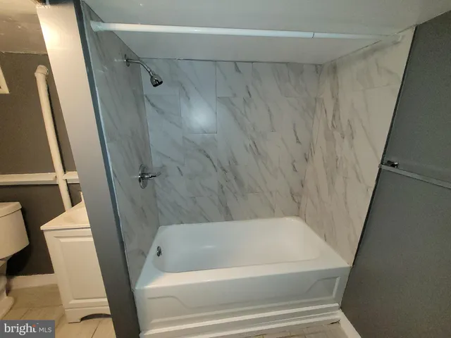a bathroom with a bathtub