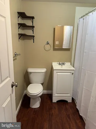 a bathroom with a toilet and a sink
