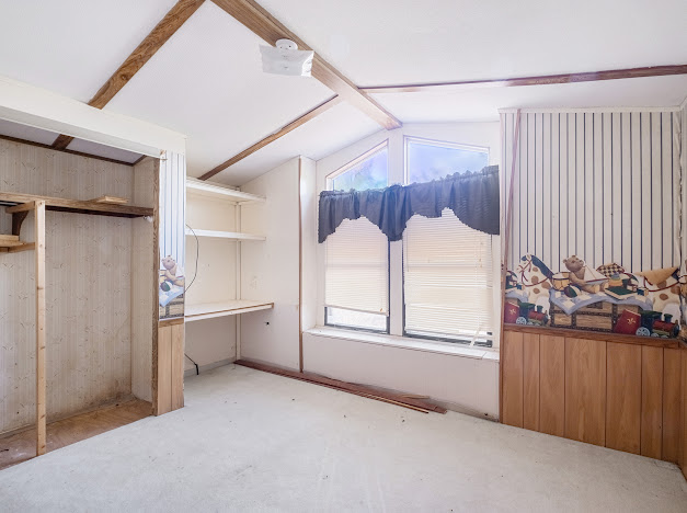 119 East Clearview Cemetery Road Bastrop, TX 78602 - Photo 14 of 22 an empty room with windows
