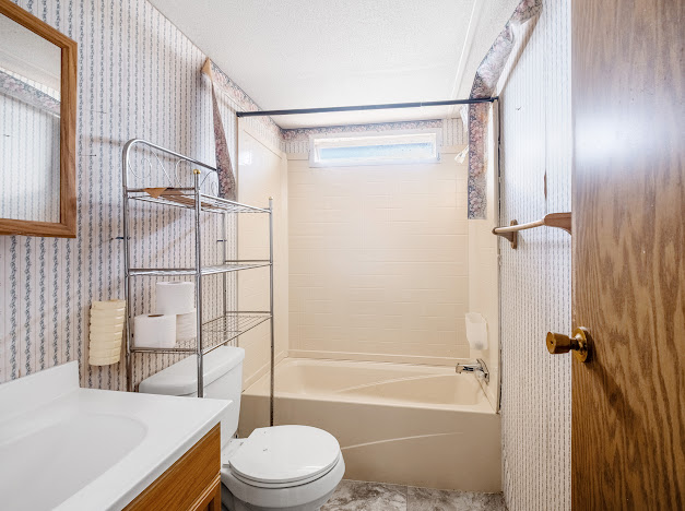 119 East Clearview Cemetery Road Bastrop, TX 78602 - Photo 15 of 22 a bathroom with a sink toilet and shower