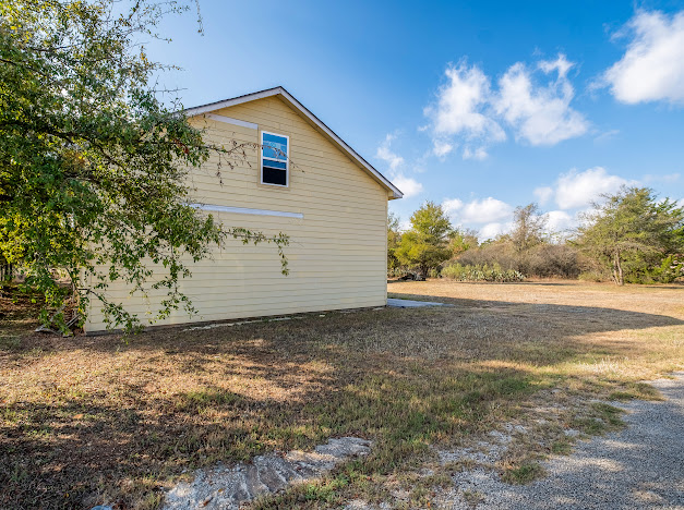 119 East Clearview Cemetery Road Bastrop, TX 78602 - Photo 2 of 22 a view of a backyard