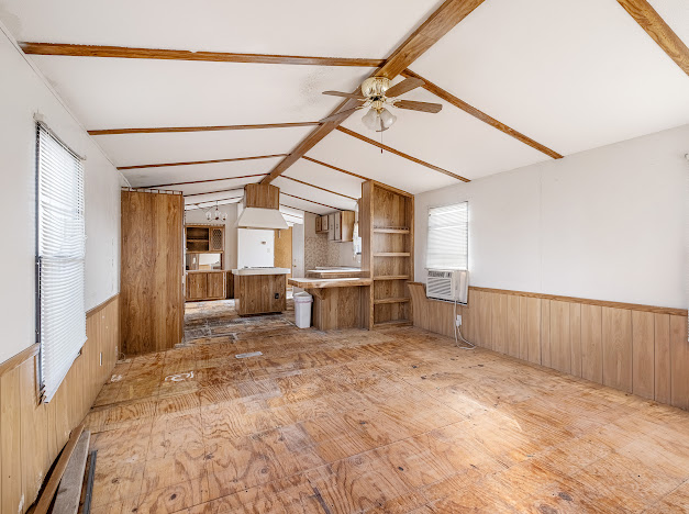 119 East Clearview Cemetery Road Bastrop, TX 78602 - Photo 6 of 22 a view of a big room with wooden cabinets and refrigerator