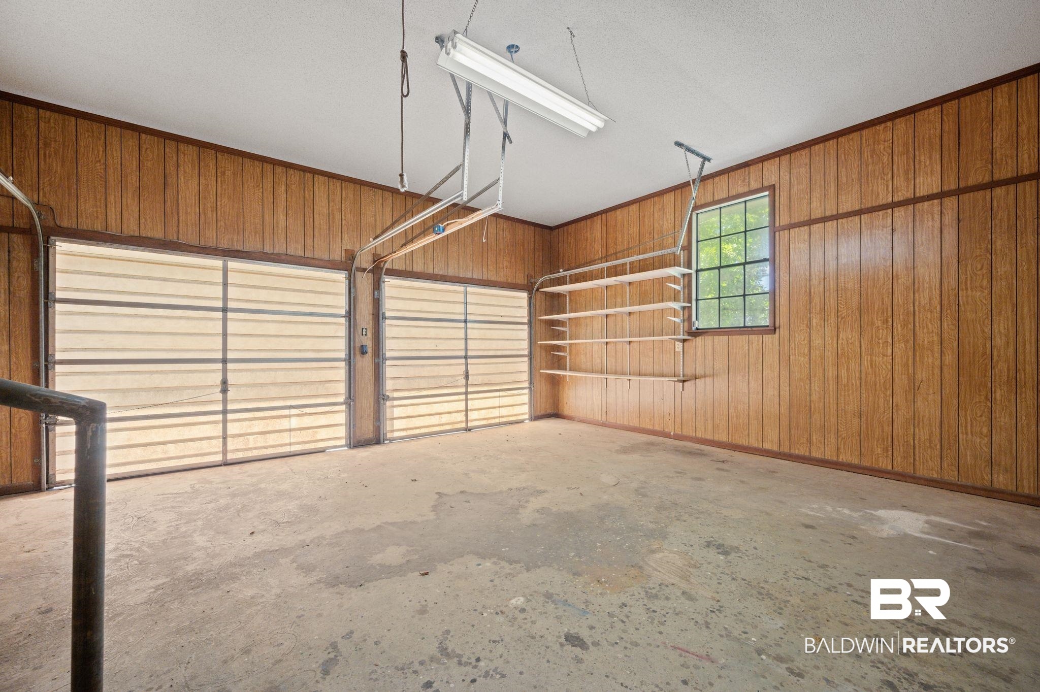 15880 Pine Grove Rd Extension West Bay Minette, AL 36507 - Photo 19 of 44 Garage with wood walls
