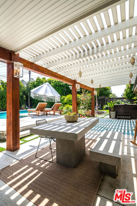18924 Cantara Street Reseda, CA 91335 - Photo 21 of 31 a view of swimming pool with a patio