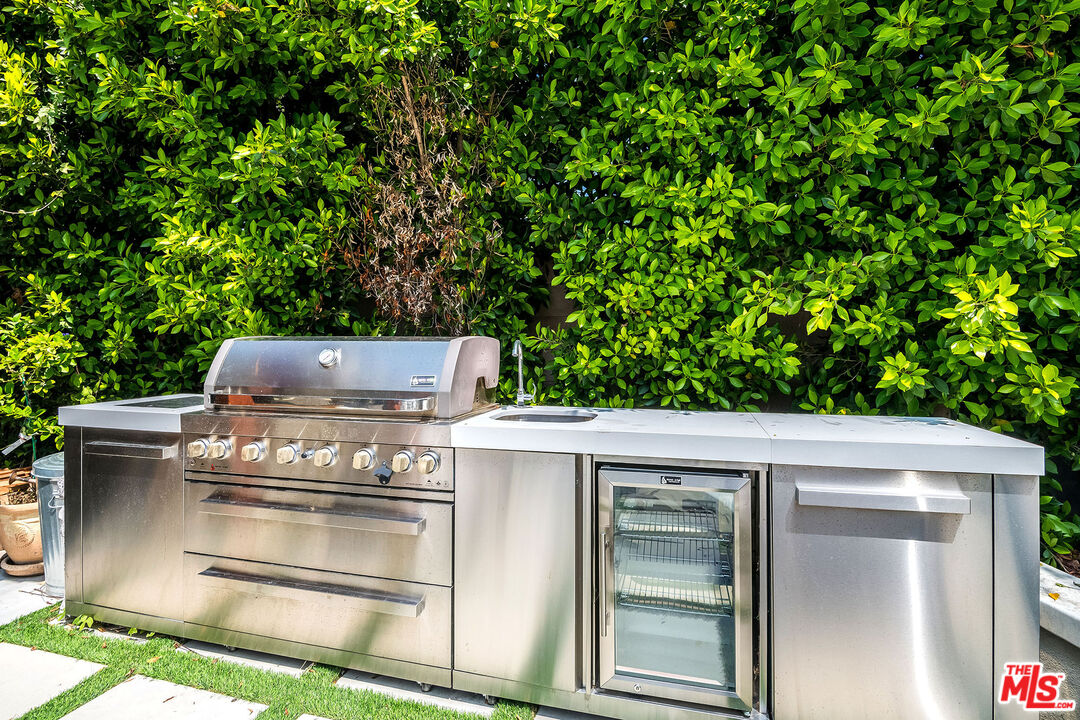 18924 Cantara Street Reseda, CA 91335 - Photo 23 of 31 a view of a fireplace with a tree