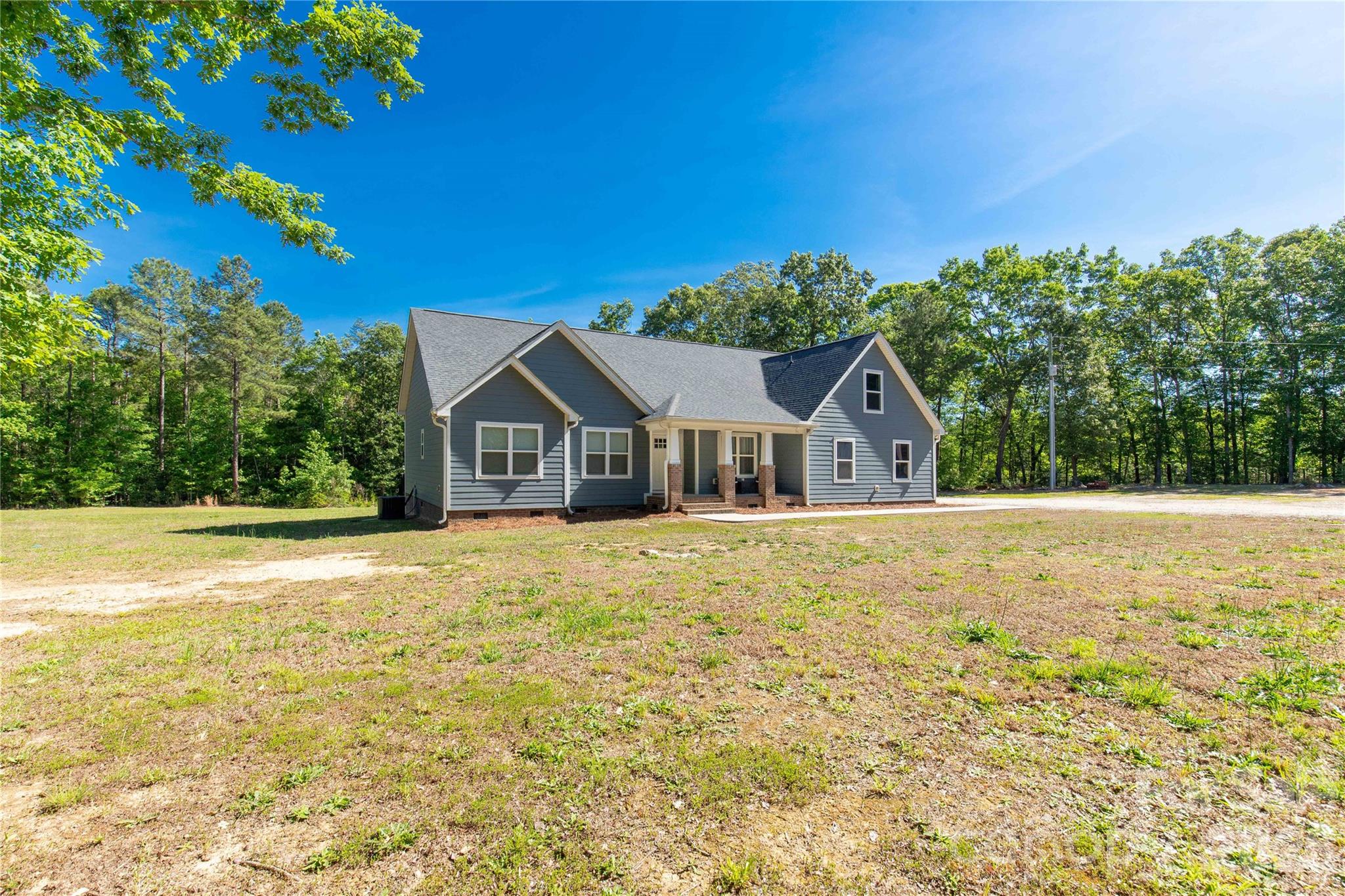 4335 Palmer Lloyd Road Lancaster, SC 29720 - Photo 3 of 33 a house with trees in the background