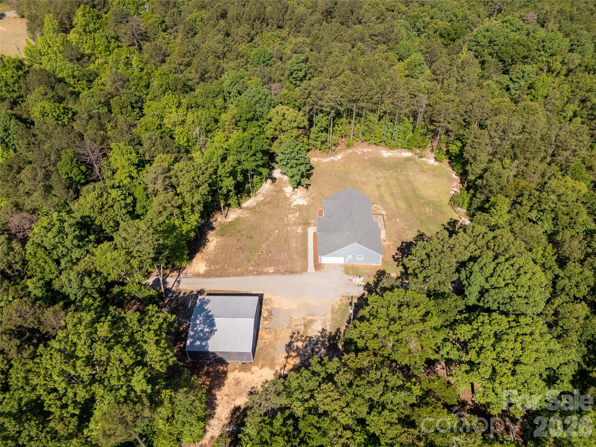 4335 Palmer Lloyd Road Lancaster, SC 29720 - Photo 33 of 33 an aerial view of a house with a yard and trees all around
