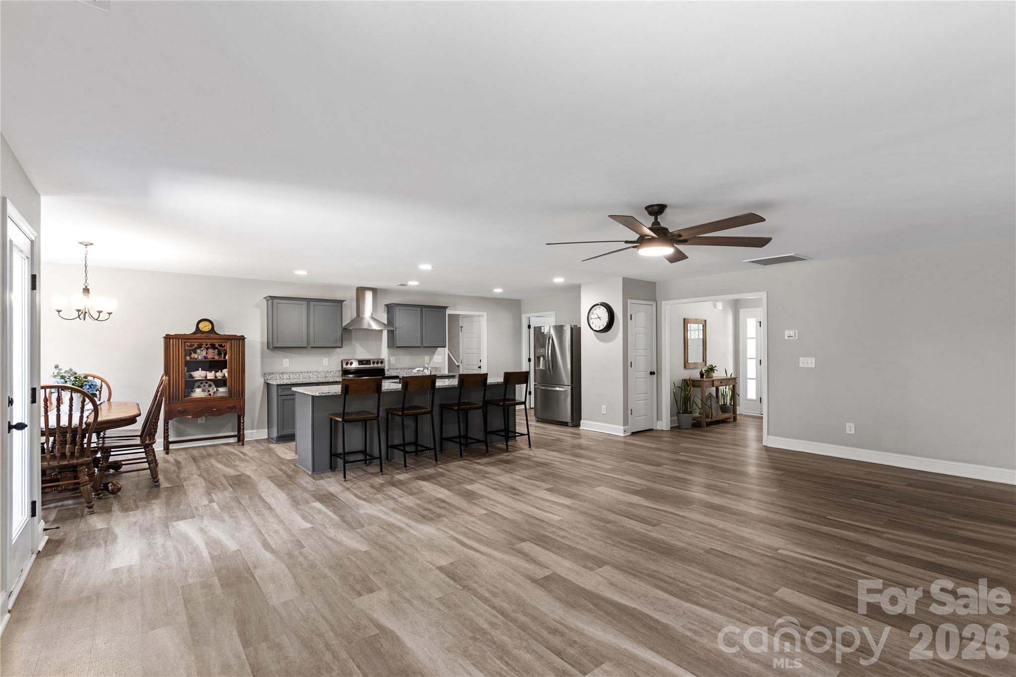 4335 Palmer Lloyd Road Lancaster, SC 29720 - Photo 9 of 33 a living room with furniture and a wooden floor