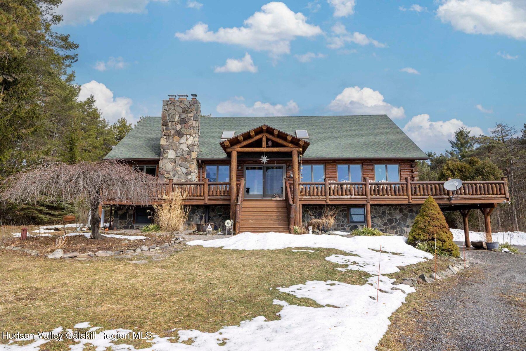 406 Cheese Hill Road Preston Hollow, NY 12469 - Photo 50 of 59 a front view of a house with a yard