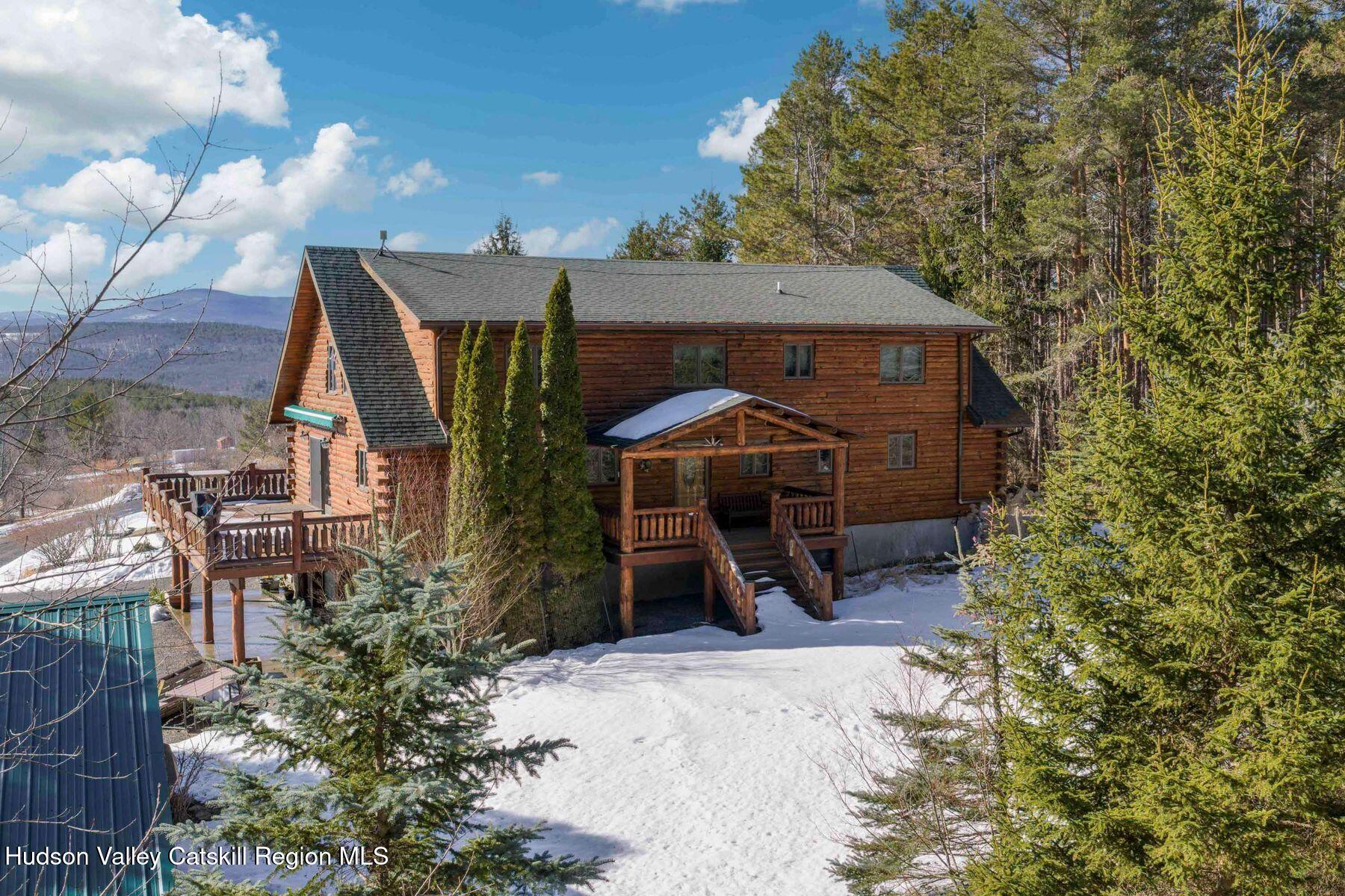 406 Cheese Hill Road Preston Hollow, NY 12469 - Photo 5 of 59 a view of a house with backyard and sitting area