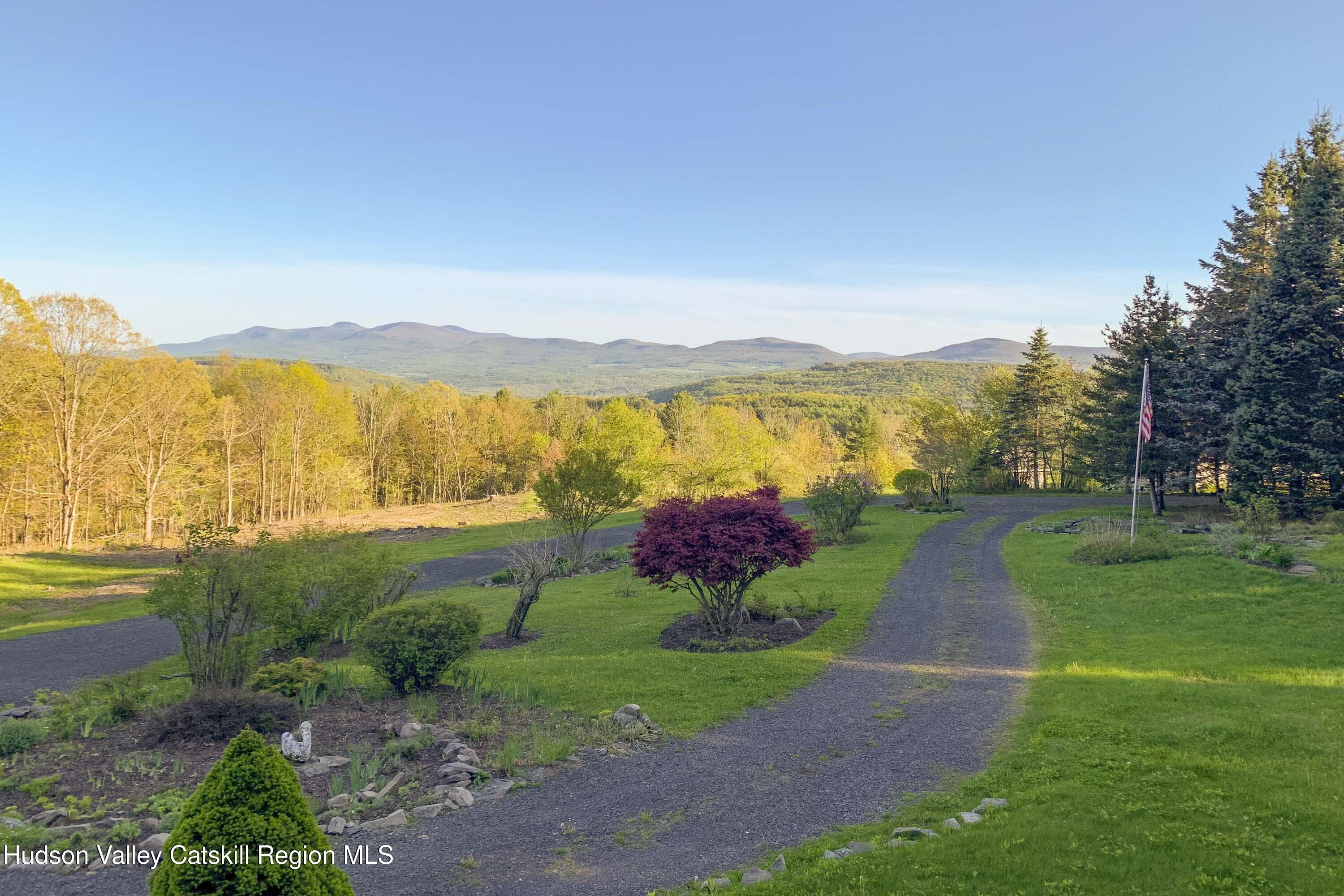 406 Cheese Hill Road Preston Hollow, NY 12469 - Photo 9 of 59 a view of a town with mountains in the background