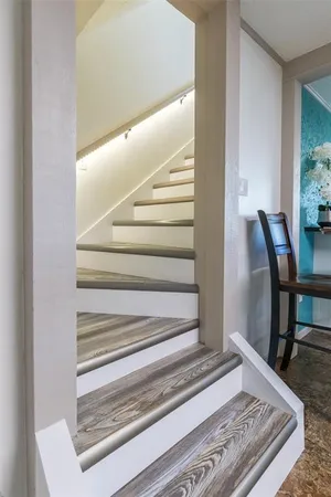 a bedroom with a bed and a fireplace