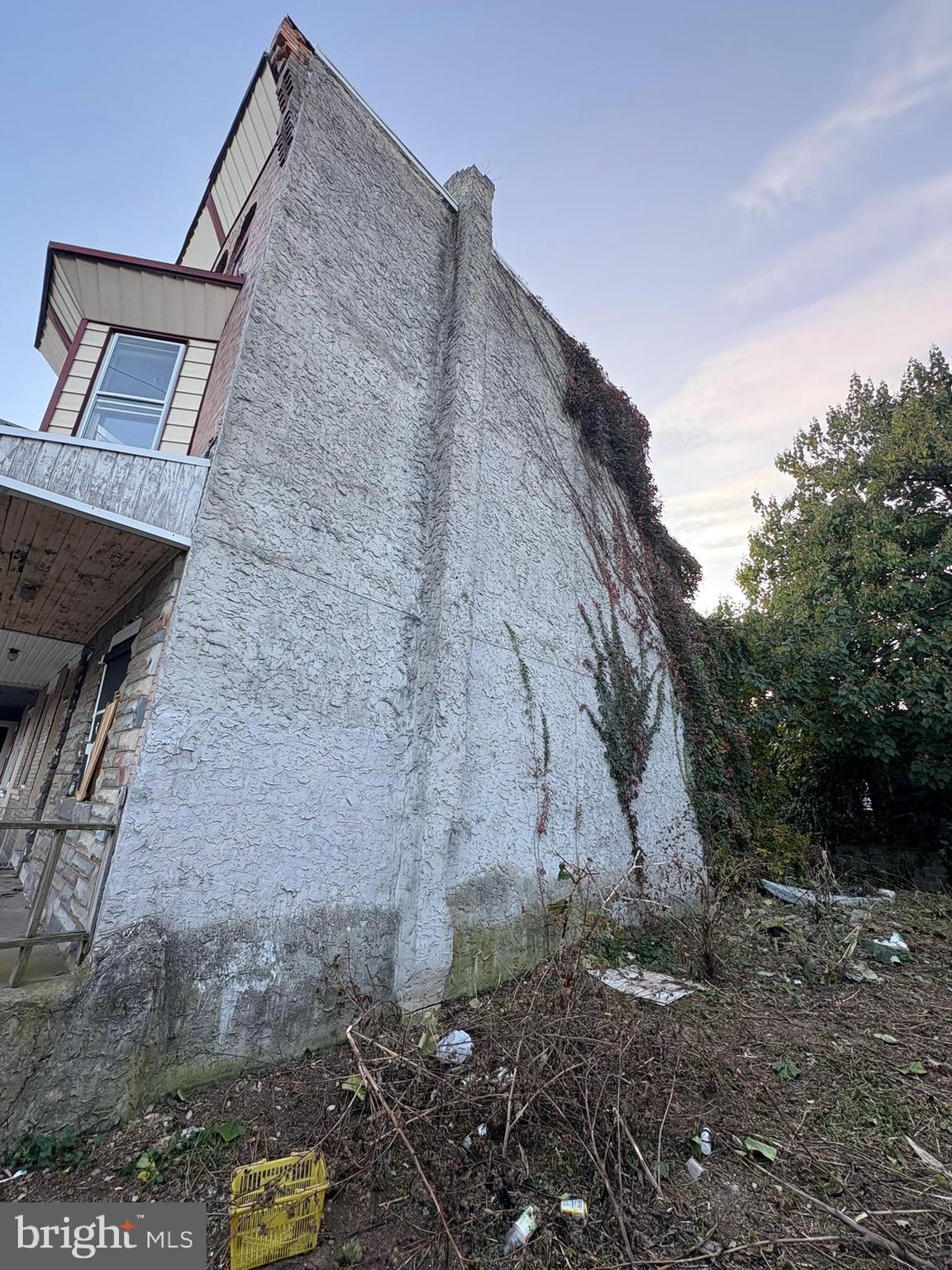350 North 61st Street Philadelphia, PA 19139 - Photo 2 of 21 a backyard of a house with lots of green space