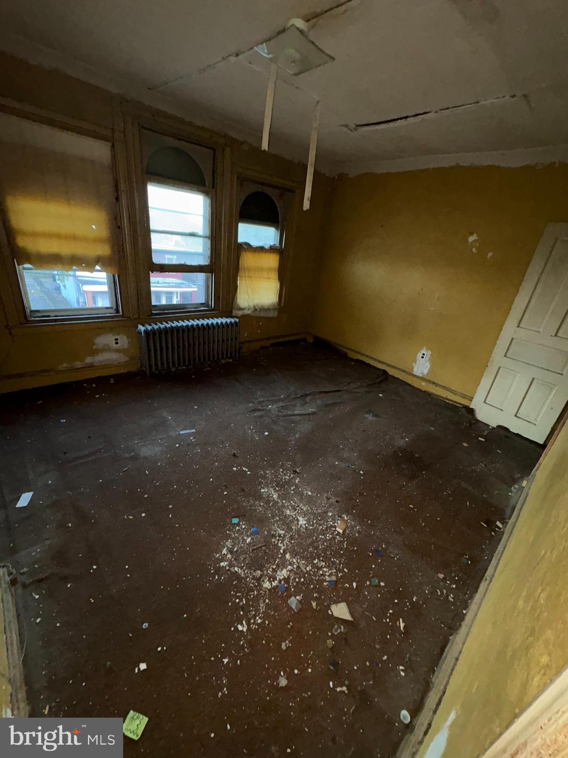 350 North 61st Street Philadelphia, PA 19139 - Photo 21 of 21 a view of an empty room with two window and a living room