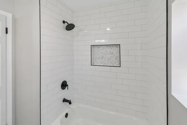 a bathroom with a bathtub