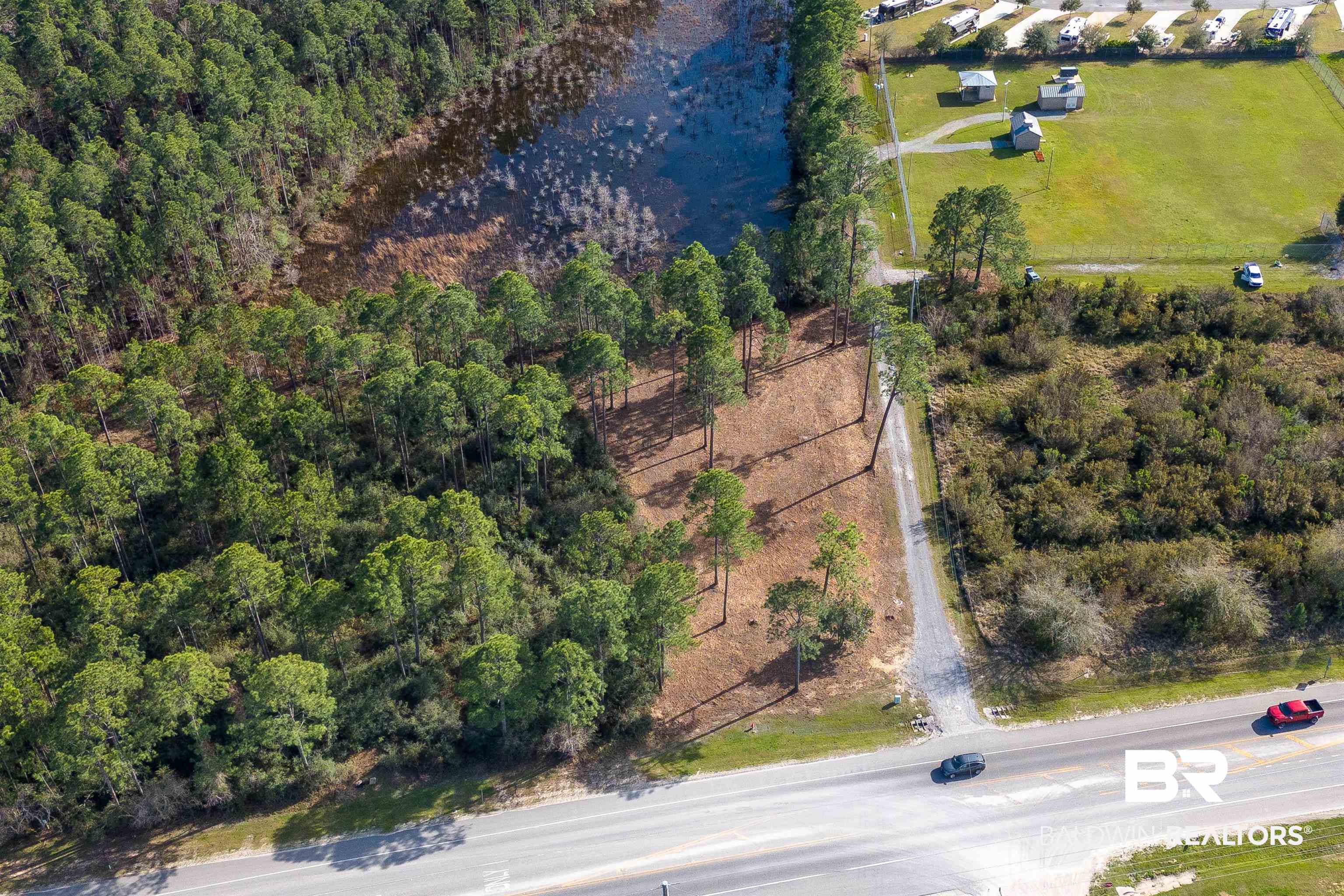 0 Canal Road Orange Beach, AL 36561 - Photo 22 of 25 Aerial view with a wooded view