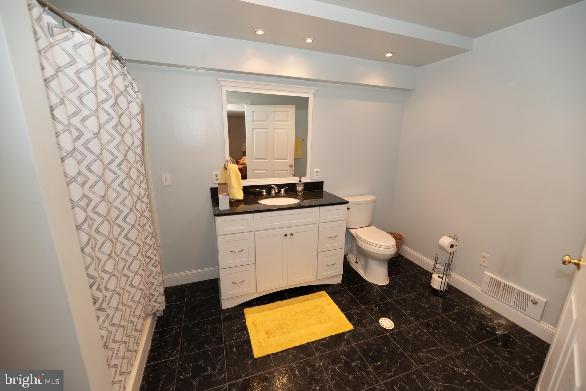 1342 Marburg Road Spring Grove, PA 17362 - Photo 54 of 62 a bathroom with a toilet sink and mirror